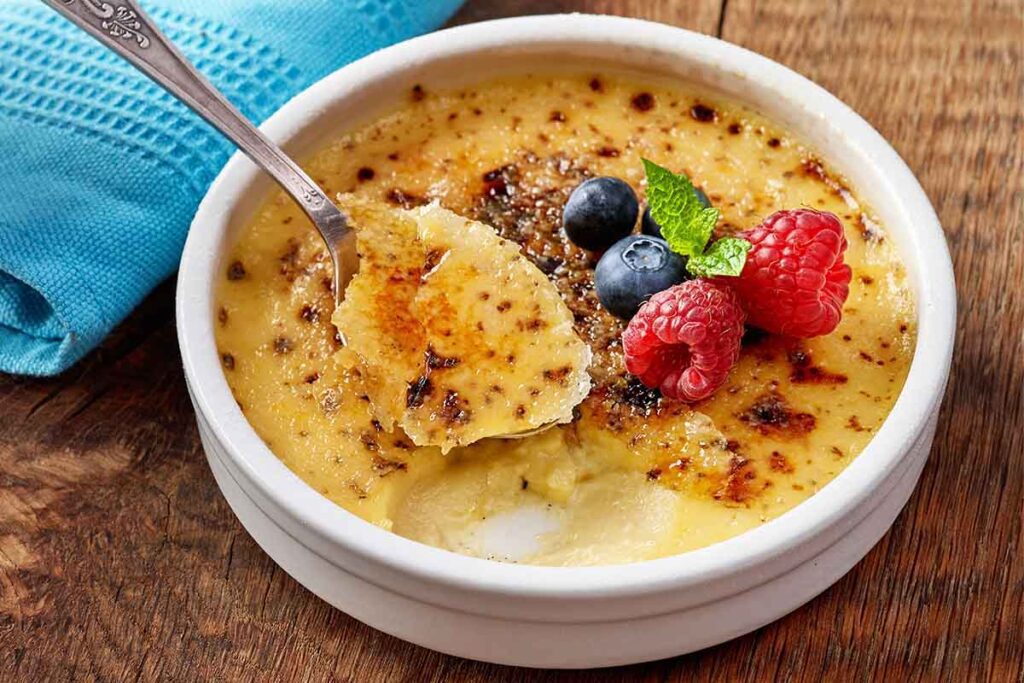 Learn how to caramelize crème brûlée with a torch or oven for a perfect crust. Discover tips, tools, and variations for this classic dessert.