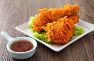 McDonald's fried chicken sandwich, McDonald's Crispy Chicken preparation, McDonald's chicken sandwich fried, McDonald's chicken frying process, McDonald's Crispy Chicken vs McChicken