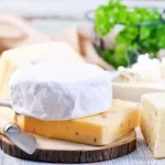 The key differences between Gruyère and Cheddar cheese, including flavor, texture, and the best ways to use each in cooking and recipes.